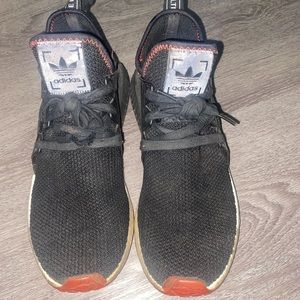 Black adidas NMD shoes